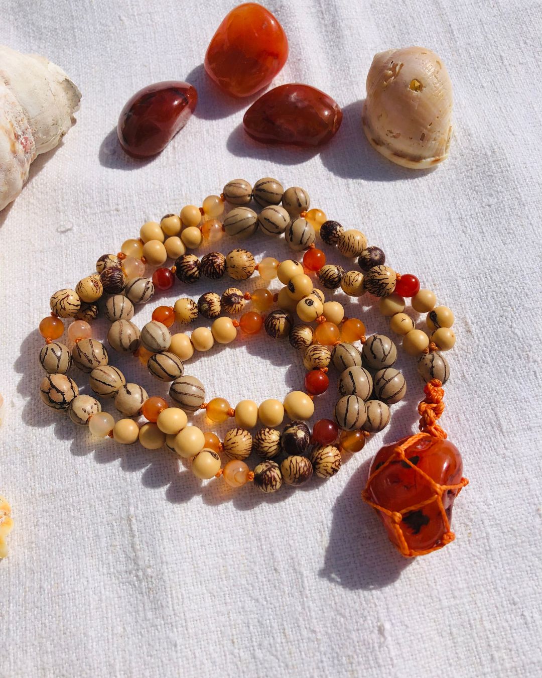 Mala chassa sacré cornaline Mala chassa sacré cornaline